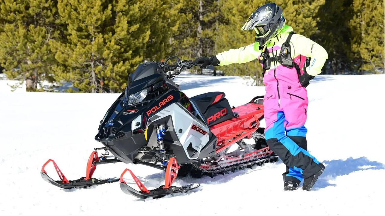 front side view of a 2026 Polaris Pro RMK patriot boost snowmobile