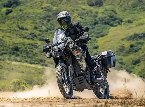 Off-road vehicle driving over rocks