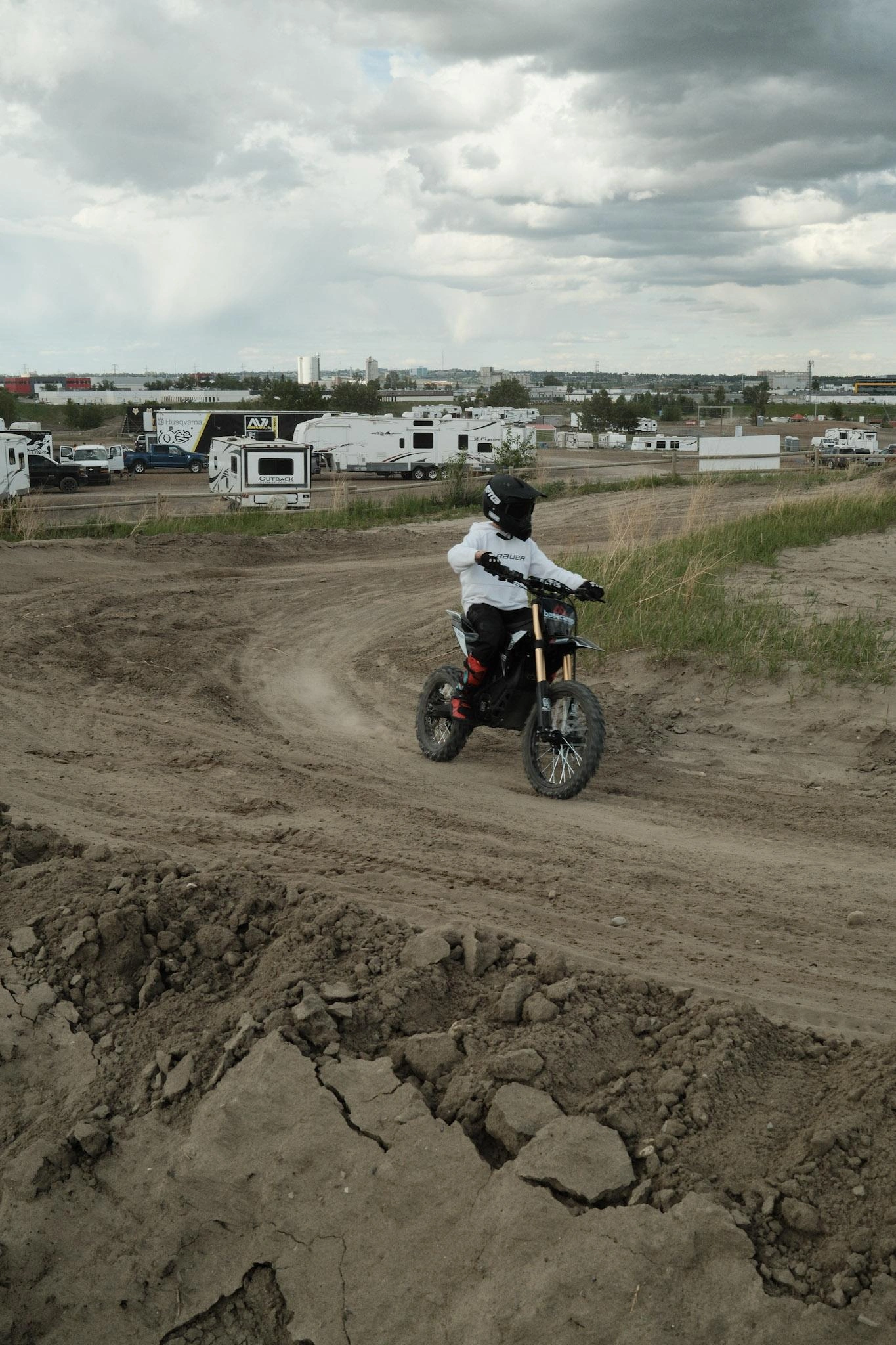 IMAGE: Rider on an Altis Sigma electric dirt bike on a motocross track