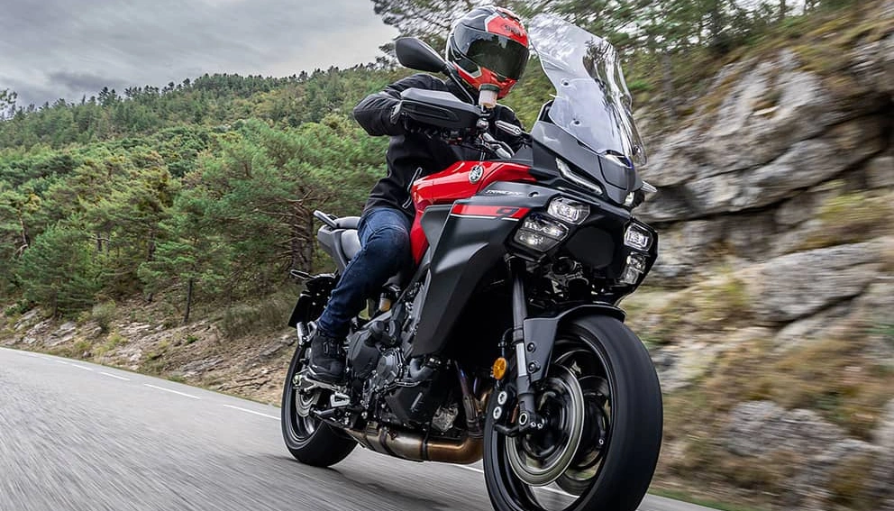 A view of the Yamaha Tracer 9 GT+ on the road at full throttle
