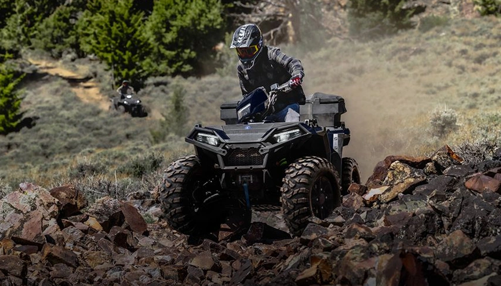 View of the Polaris Sportsman 850 on a steep rocky hillside