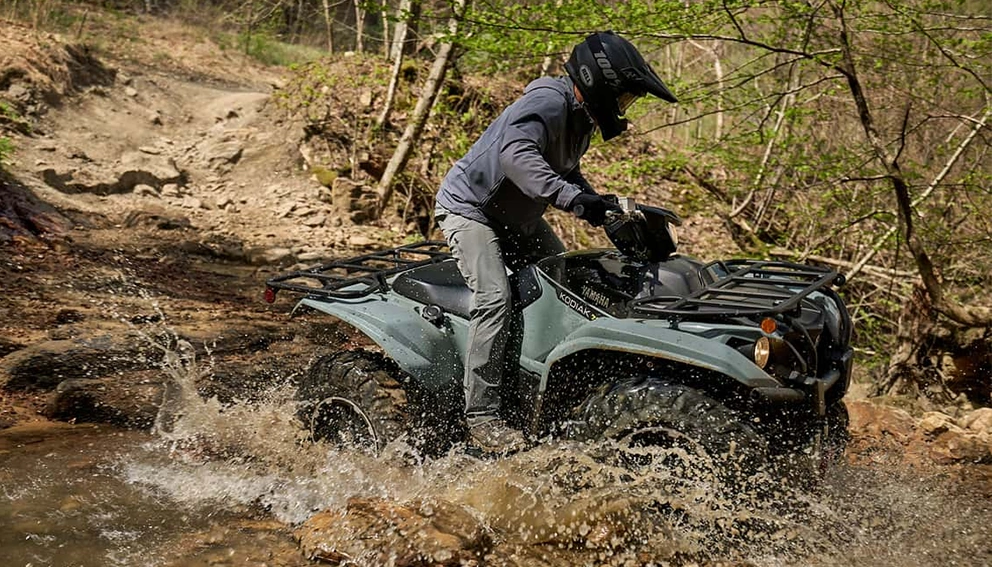 View of the Yamaha Kodiak 700 crossing a puddle