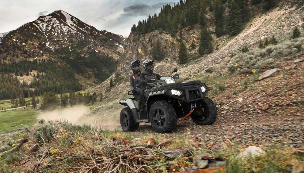 View of the Polaris Sportsman Touring XP 1000 Trail on a forest trail