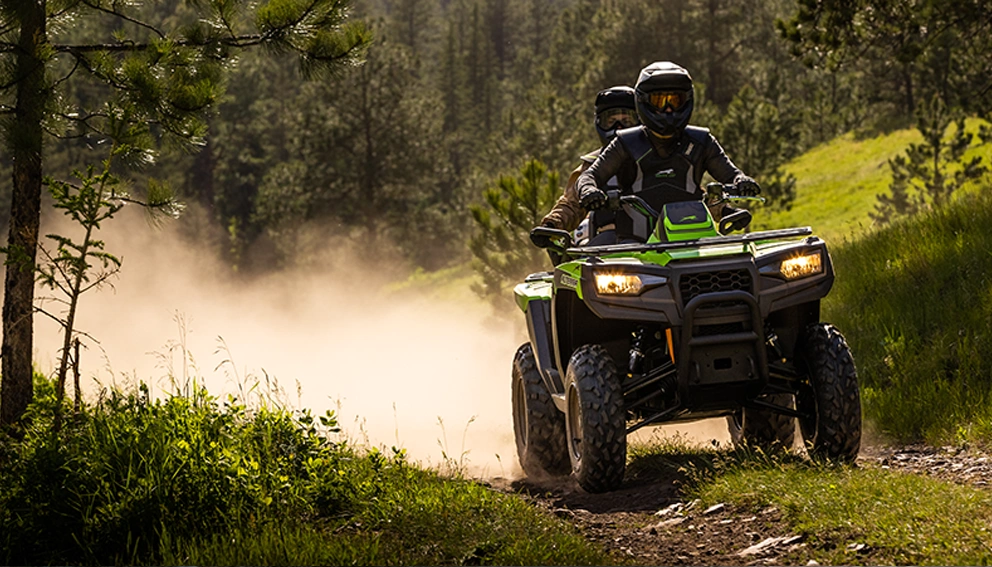View of the Arctic Cat Alterra 600 TRV on a sandy road