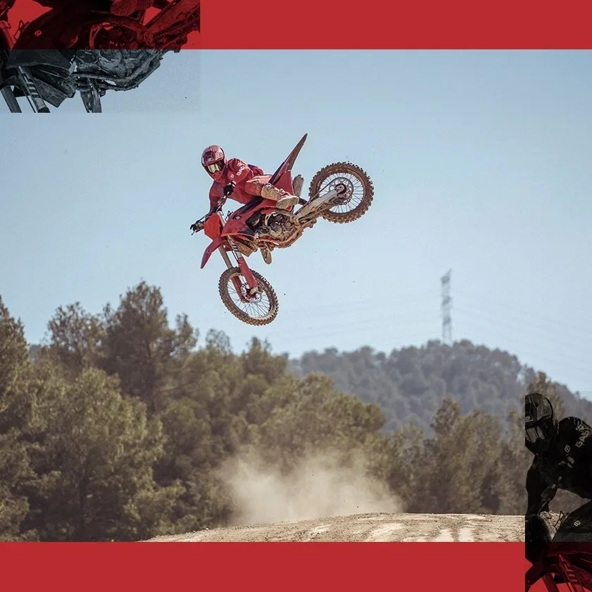 GasGas MC 450F rouge en plein saut sur un circuit de motocross.