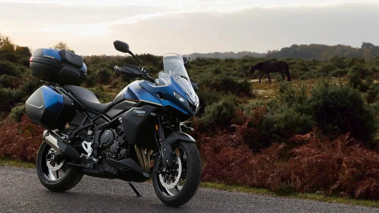Triumph Tiger Sport touring motorcycle riding on a highway