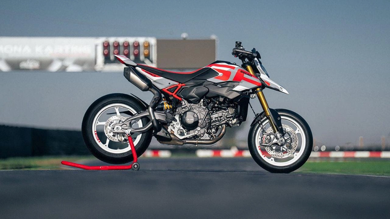 Ducati Hypermotard motorcycle leaning into a curve on a racetrack