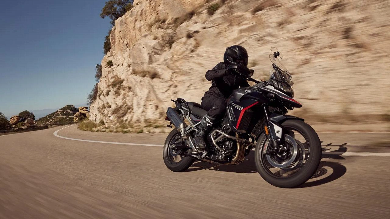 Triumph Tiger 900 GT Pro motorcycle equipped with hard luggage cases