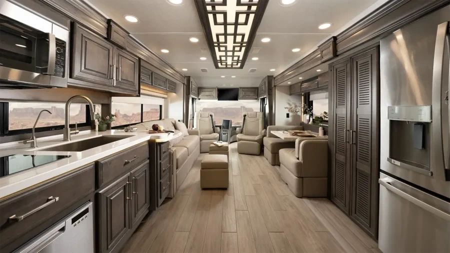 Intérieur de l’Entegra Coach Aspire avec cuisine haut de gamme et salon spacieux.