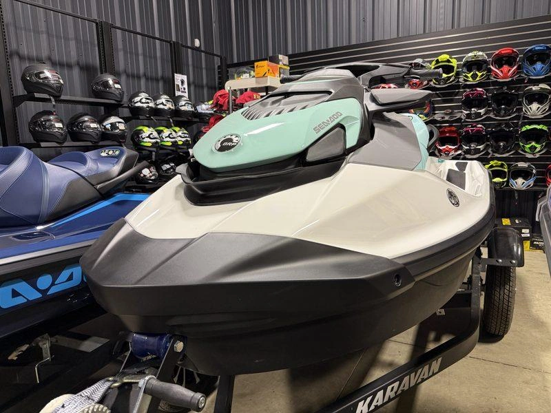 White and mint Sea-Doo GTI on a trailer inside the Precision Power Sports showroom