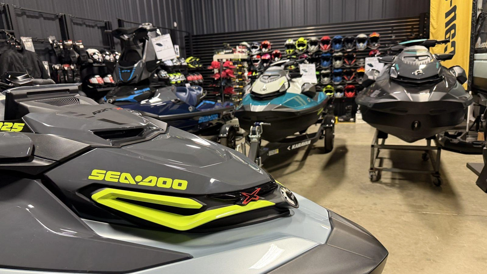 Sea-Doo watercraft parked indoors in the Precision Power Sports showroom in Sarnia