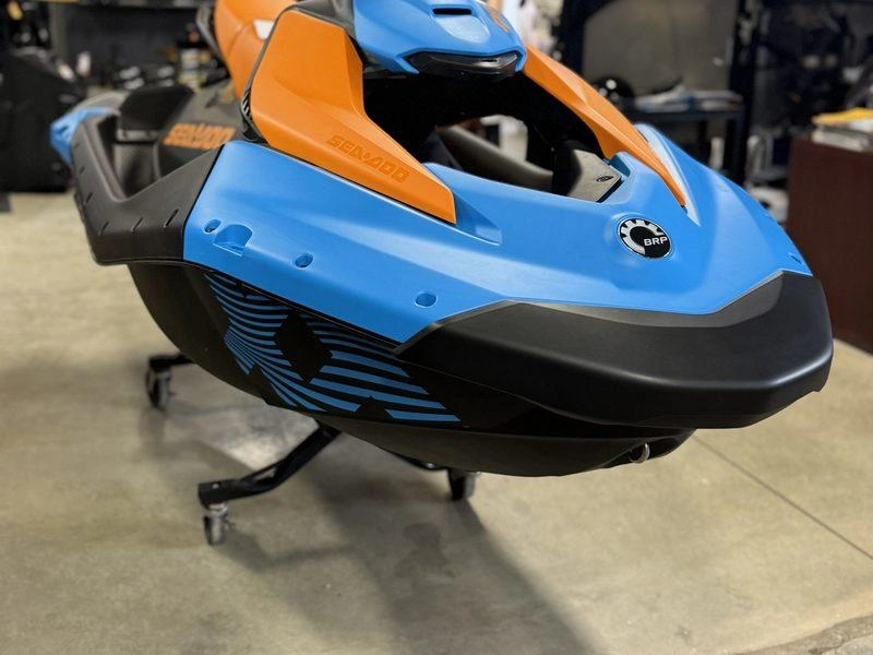 Blue and orange Sea-Doo Spark Trixx in the Precision Power Sports showroom