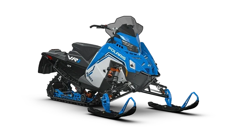 Motoneige Polaris INDY VR1 9R 2027 bleue et blanche présentée de trois quarts sur fond blanc.