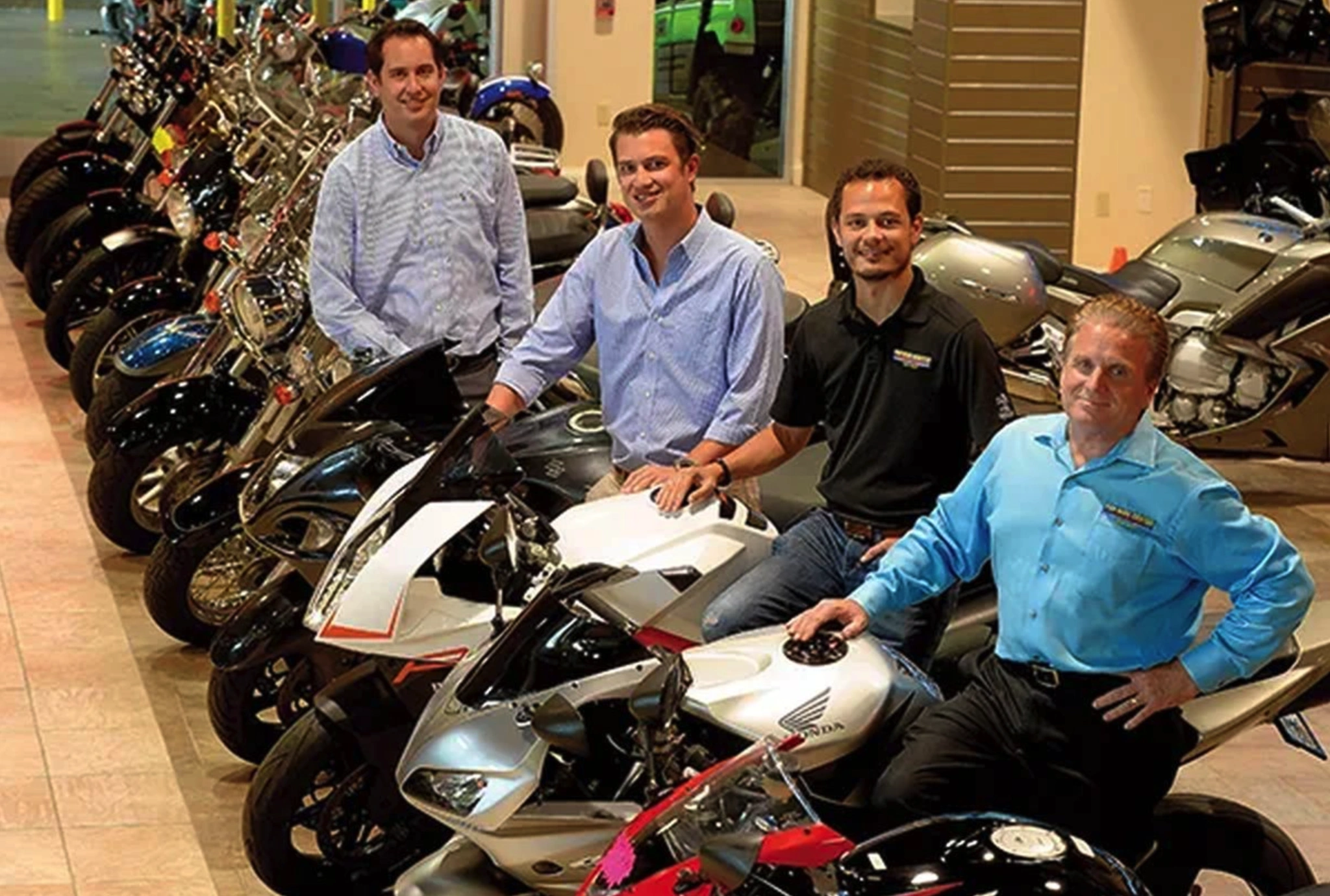 Fun Bike Center Motorsports family leadership inside the Lakeland Florida powersports showroom