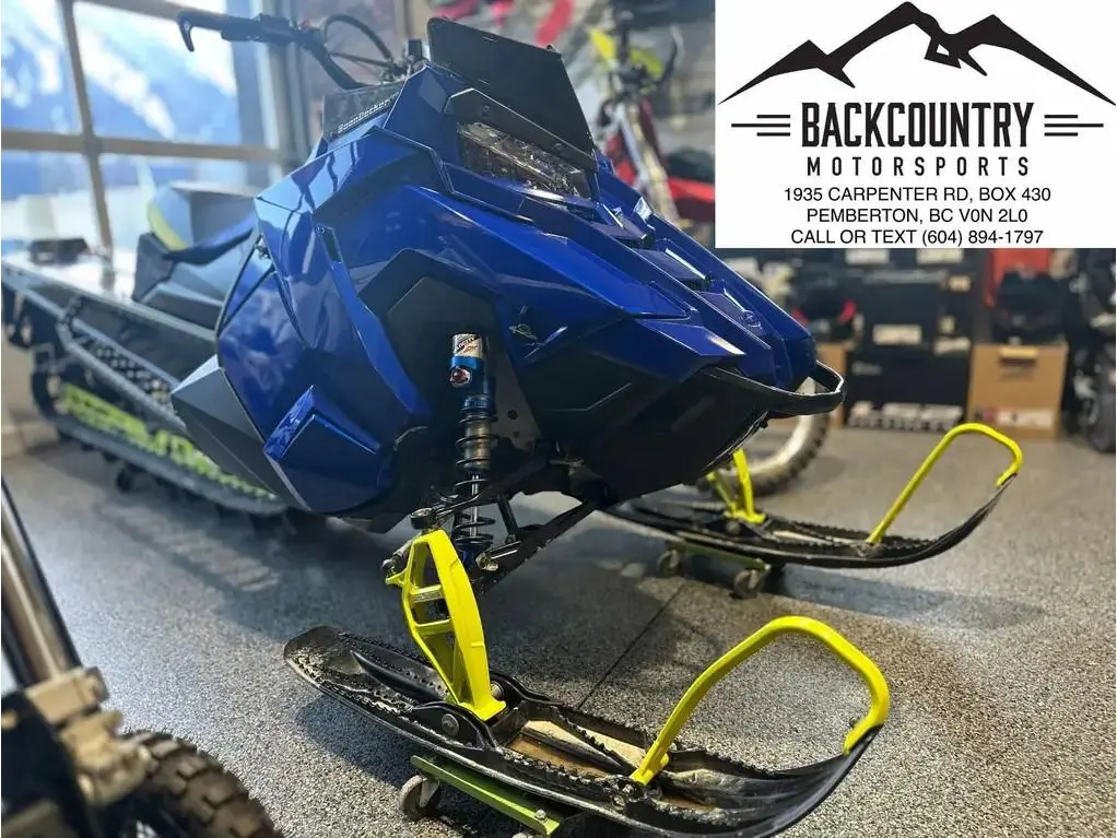 2021 Polaris 850 RMK KHAOS 155 2.75″ – Polaris Blue / Lime Squeeze