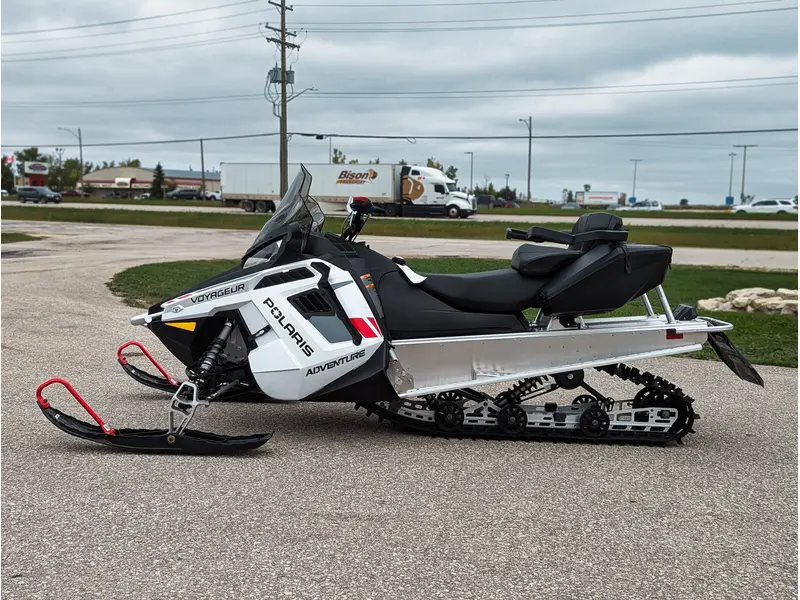 2025 Polaris 550 Voyageur Adventure // White Lightning