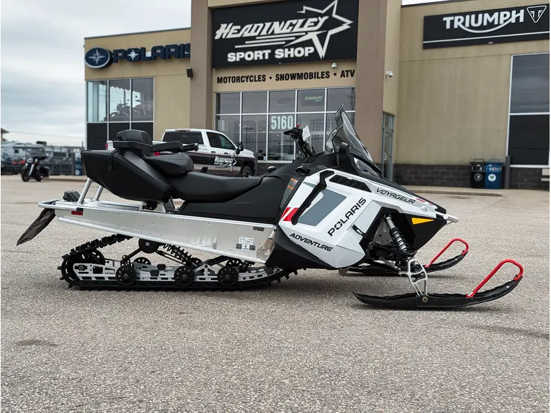 2025 Polaris 550 Voyageur Adventure // White Lightning