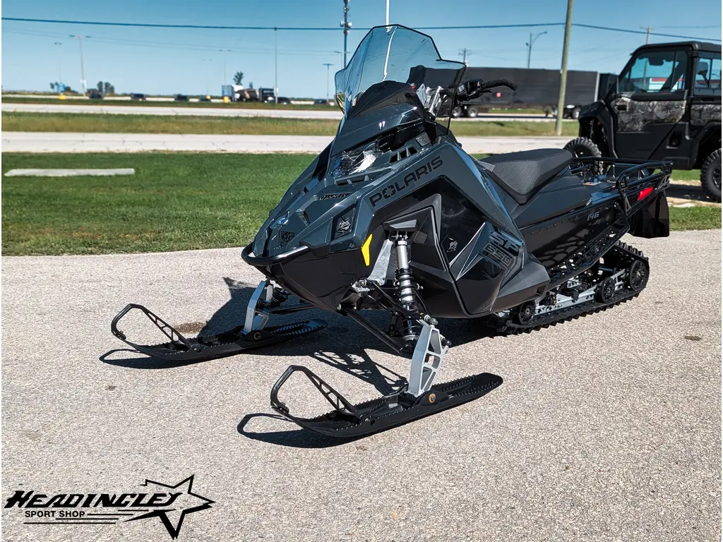 2026 Polaris 650 Voyageur SP 146 // Gloss Black/Blue Dusk 