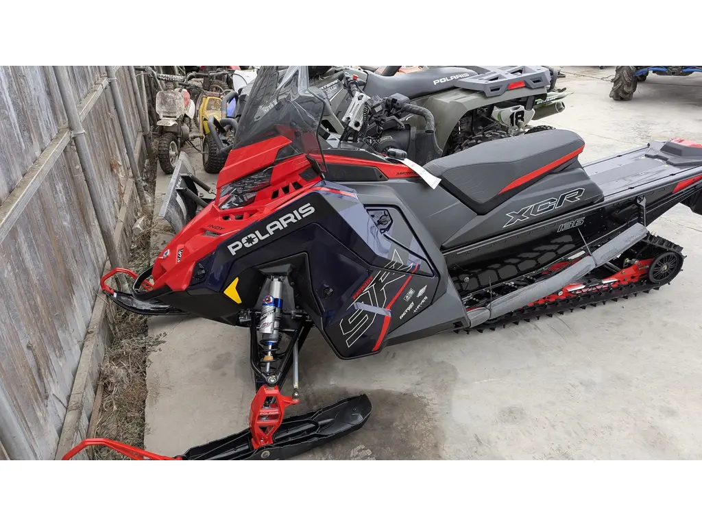 2025 Polaris 9R Indy XCR 136 Midnight Blue Metallic / Indy Red 