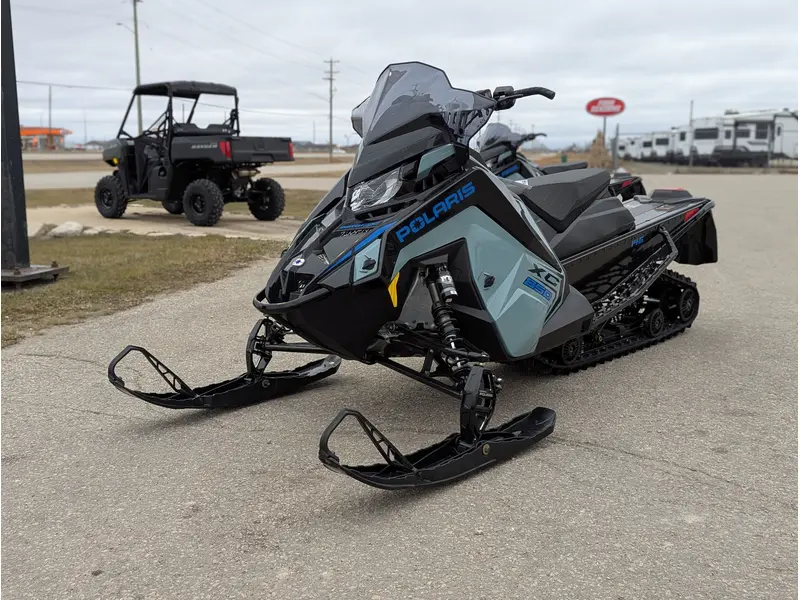 2026 Polaris 850 Switchback XC 146 // Hemlock Blue/Black/Velocity Blue