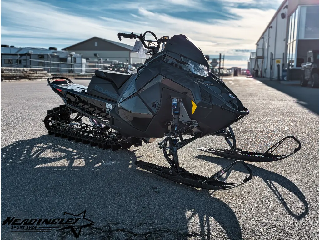 2026 Polaris Patriot 9R RMK Khaos 146 // Gloss Black/Blue Dusk 