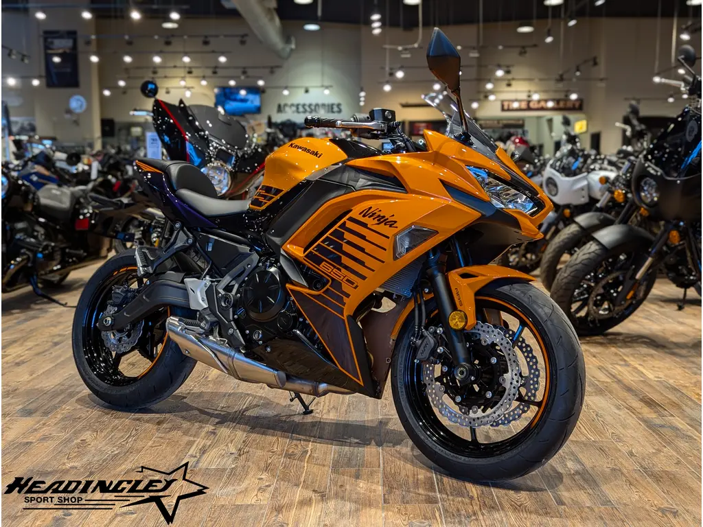 2025 Kawasaki Ninja 650 // Candy Steel Furnace Orange / Metallic Spark Black / Metallic Royal Purple