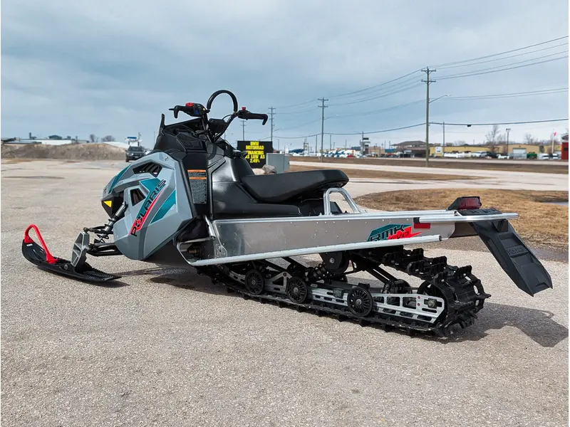 Polaris 550 RMK EVO 144 // Stealth Gray w/ GB Trail Muffler & Electric Visor Plug 2024