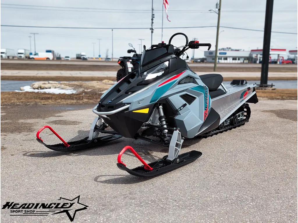 2024 Polaris 550 RMK EVO 144 // Stealth Gray - w/ GB Trail Muffler & Electric Visor Plug