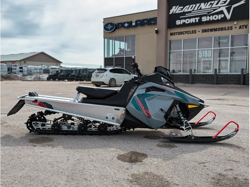 Polaris 550 RMK EVO 144 // Stealth Gray w/ GB Trail Muffler & Electric Visor Plug 2024
