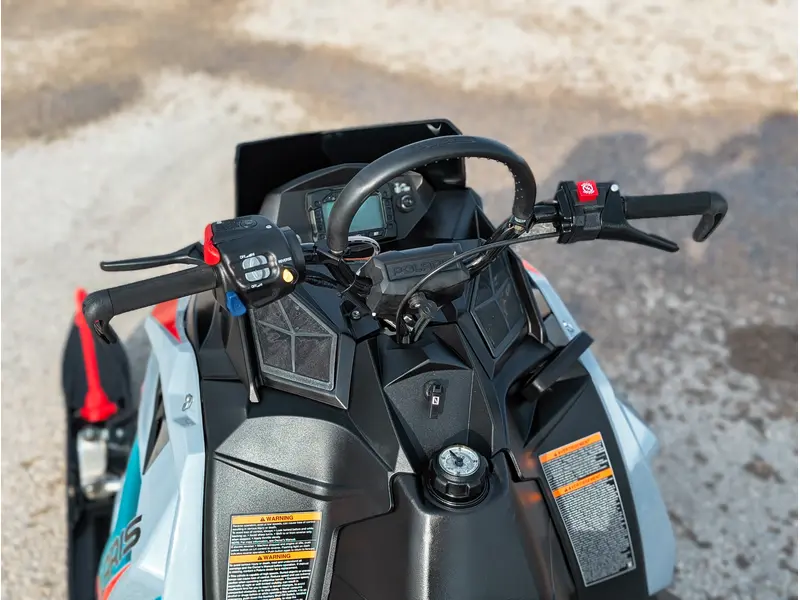 Polaris 550 RMK EVO 144 // Stealth Gray w/ Electric Visor Plug 2024