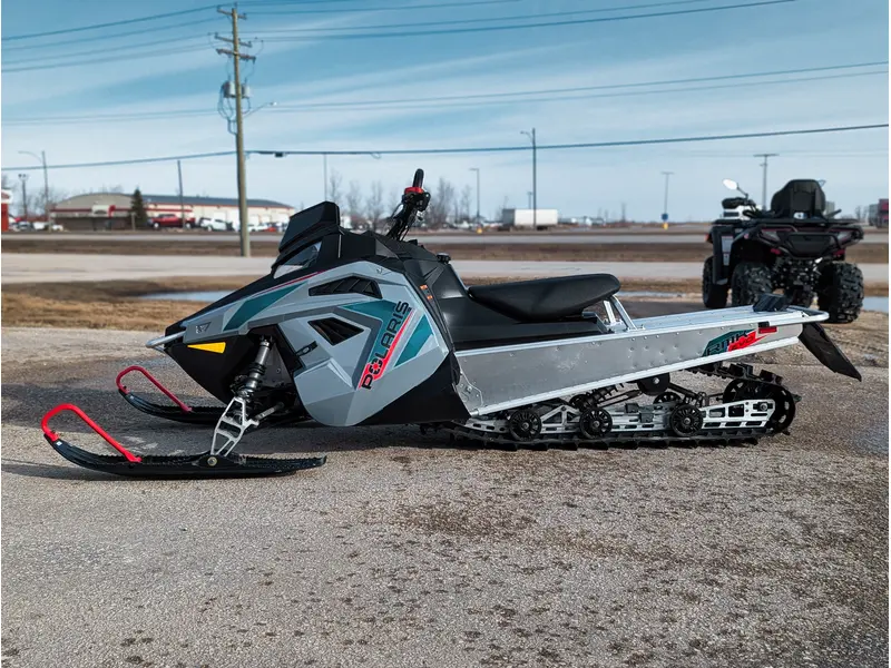 Polaris 550 RMK EVO 144 // Stealth Gray w/ Electric Visor Plug 2024