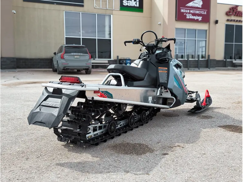 Polaris 550 RMK EVO 144 // Stealth Gray w/ GB Trail Muffler & Electric Visor Plug 2024