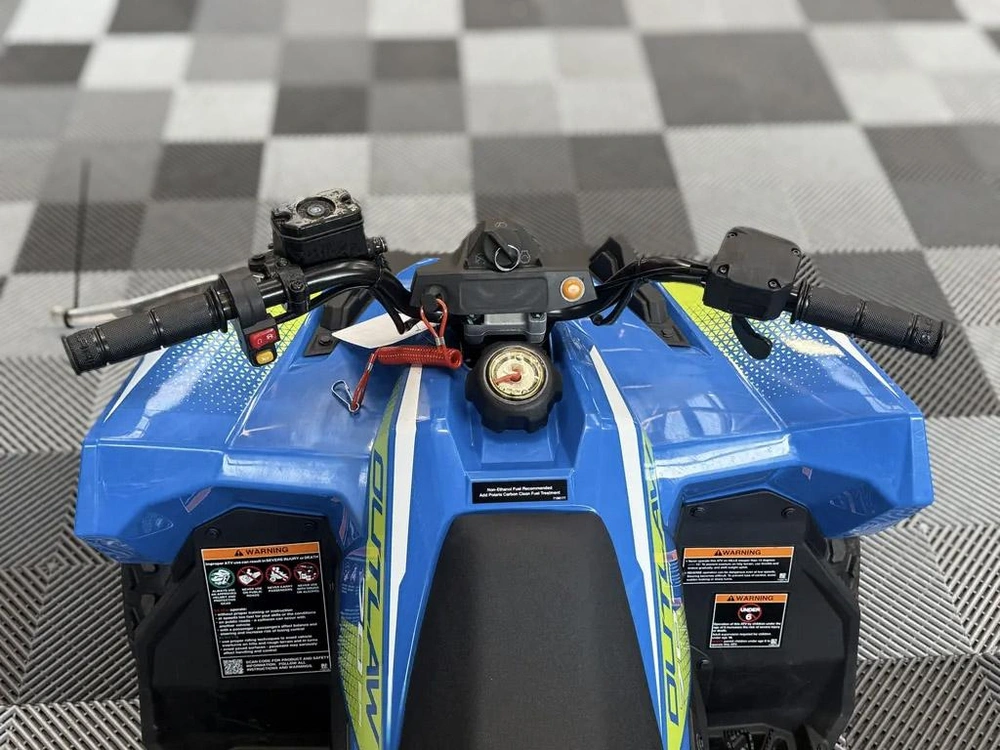 2025 Polaris Outlaw 70 Efi - Velocity Blue / Lifted Lime alt