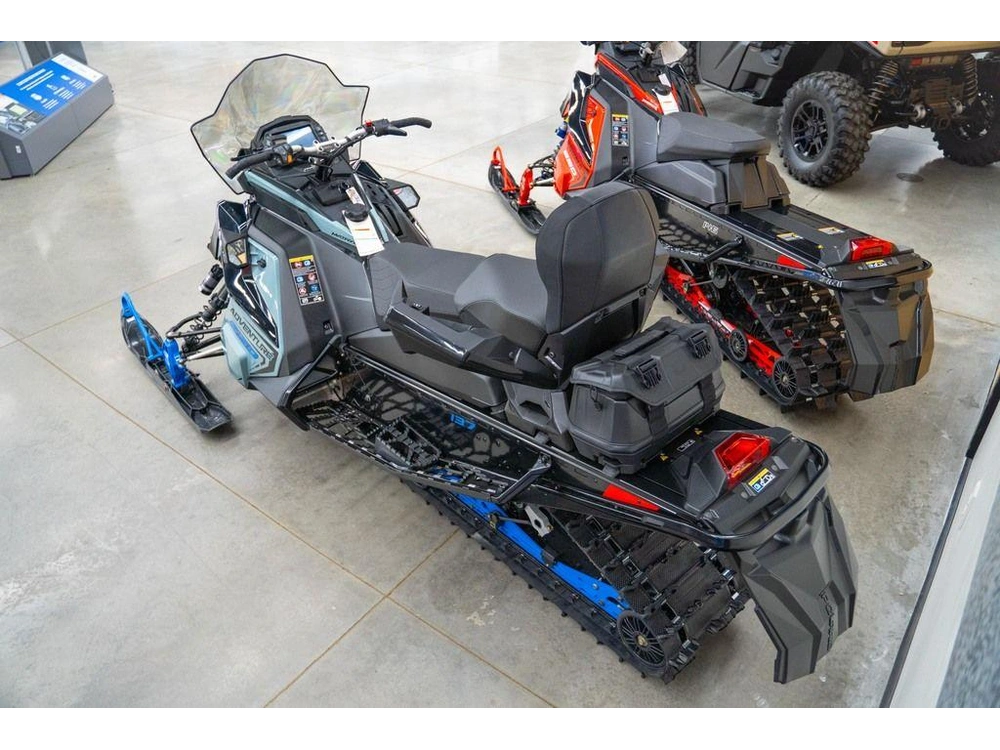 2026 Polaris 650 Indy Adventure 137 Gloss Black / Blue Dusk alt