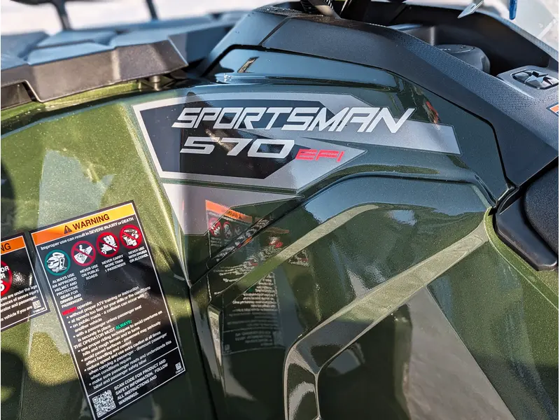 2026 Polaris Sportsman Touring 570 Premium // Treeline Green Metallic