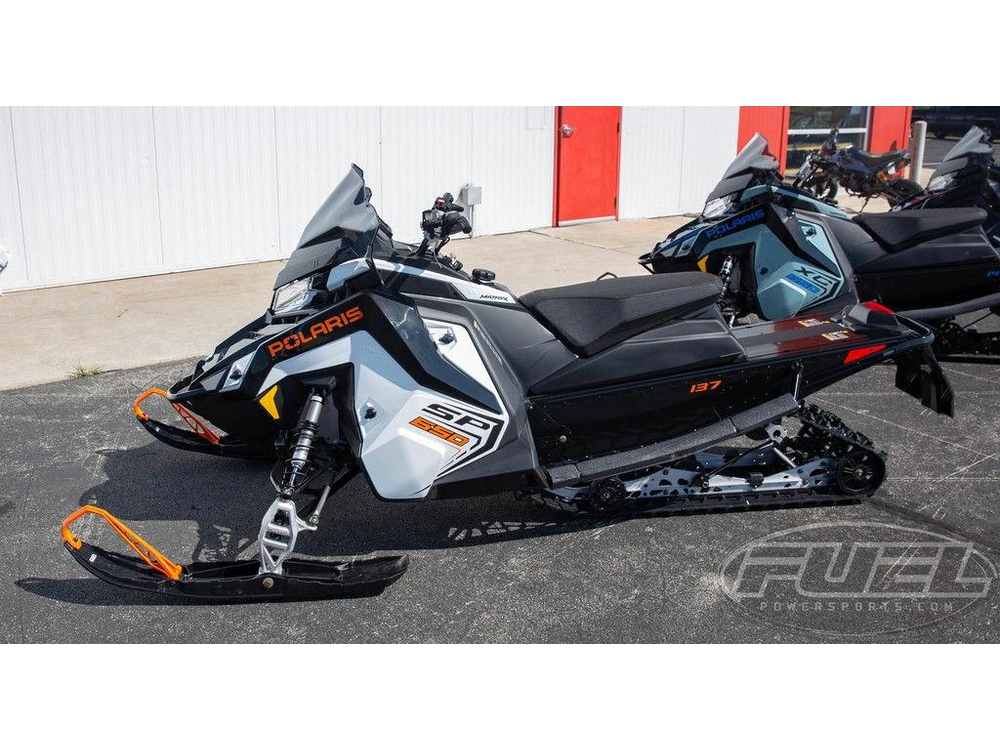 2027 Polaris 650 Indy Sp 137 White Lightning / Gloss Black / Orange Burst alt