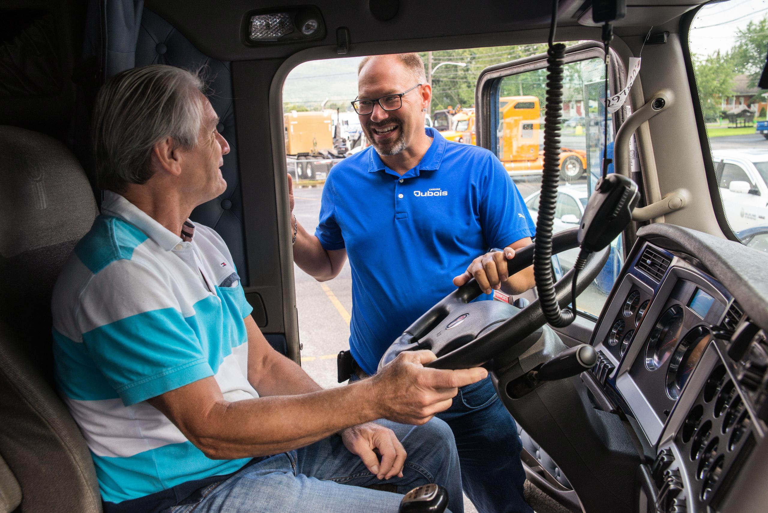 Employee and customer discussing sales and purchasing