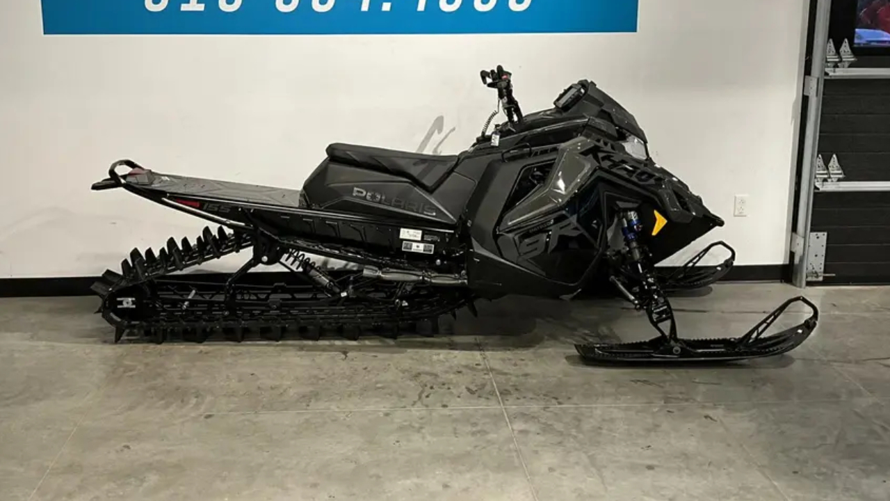 front side view of a Polaris Pro RMK 9r 155 snowmobile
