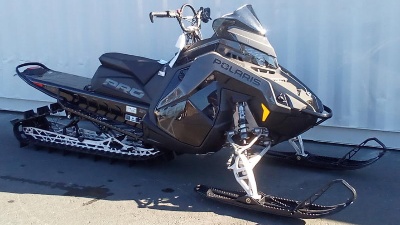 front side view of a Polaris Pro RMK 850 Matryx Slash 155 snowmobile
