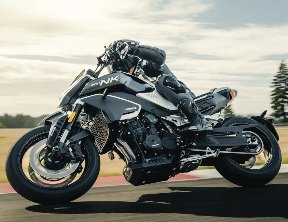 The 2024 CFMOTO 800 NK motorcycle making a turn.